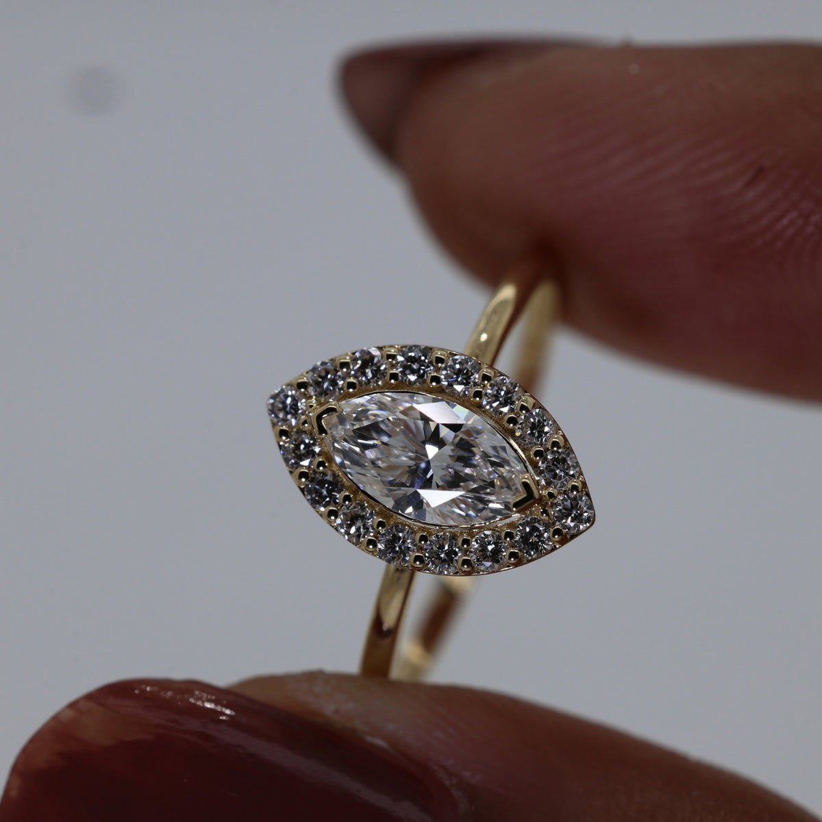 Lab Grown DiamondMarquise Cut Diamond Halo Engagement Ring in 14K Yellow Gold