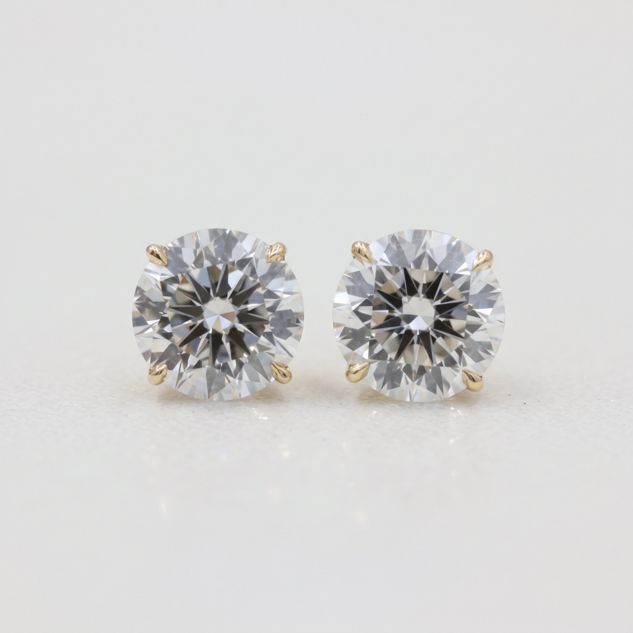 Lab Grown Round Brilliant Cut Diamond Solitaire Stud Earrings with Four-Prong Setting in 14K Yellow Gold