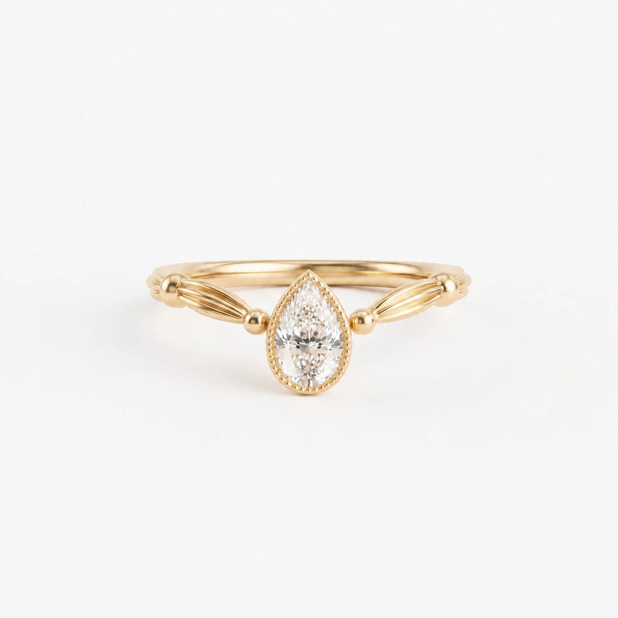 Pear Cut Diamond Bezel Engagement Ring with Vintage Inspired Band in 14K Yellow Gold