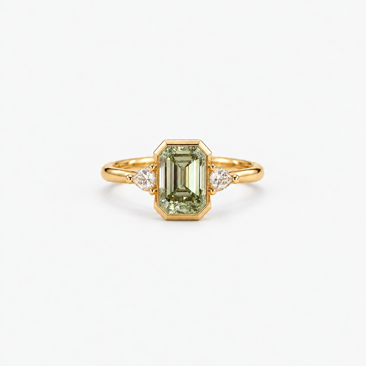 Lab Grown Green Emerald Cut Three Stone Engagement Ring with Pear Diamond Side Accents in 14K Yellow Gold