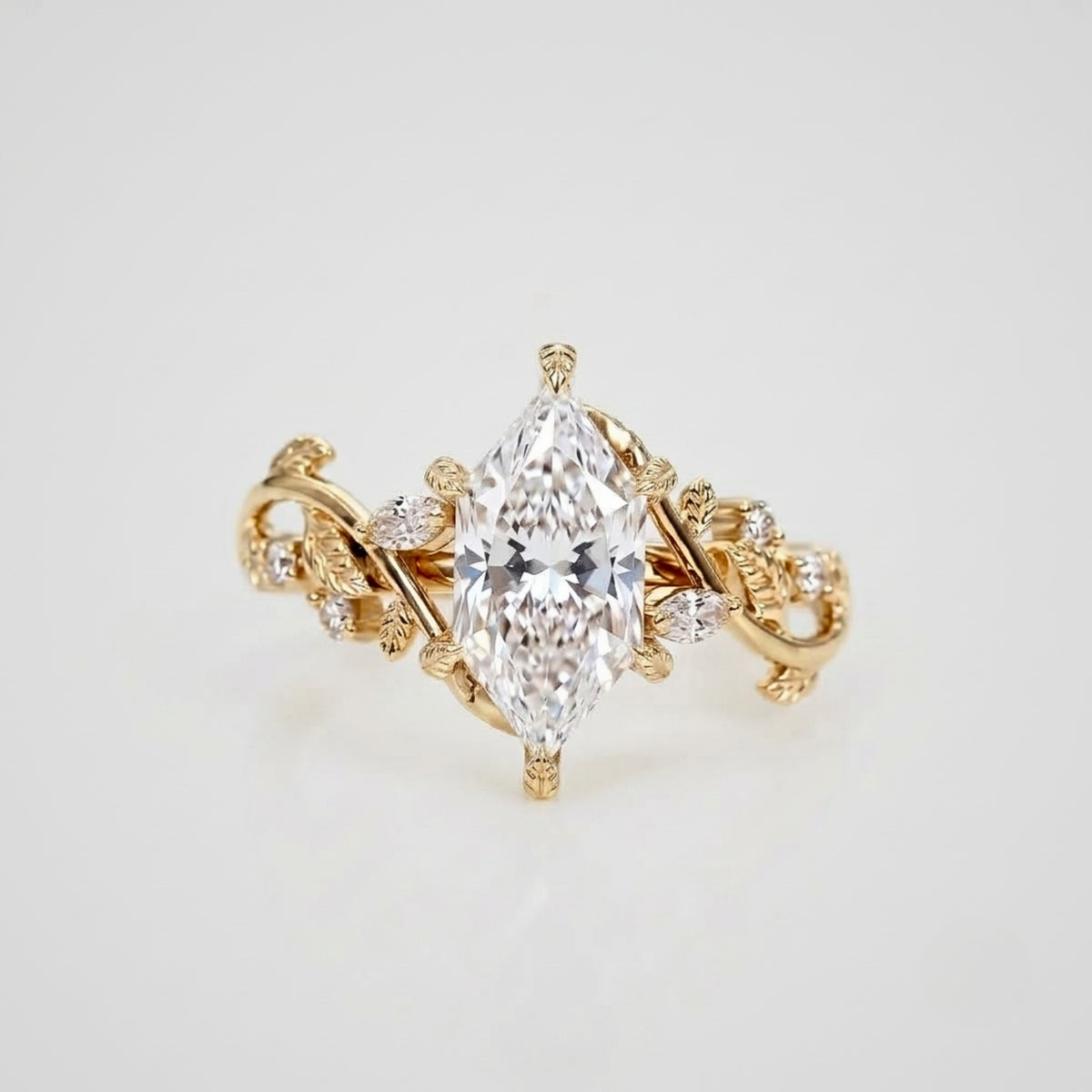 Lab Grown Diamond Dutch Marquise Cut with Marquise & Round Diamond Side Accents in Nature-Inspired Vine Band Engagement Ring IGI Certified in 14K Yellow Gold