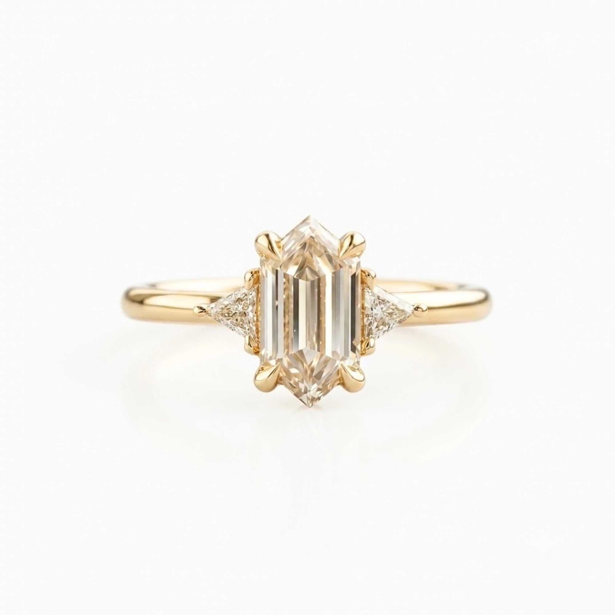 Lab Grown Diamond Elongated Hexagon Step Cut Classic Plain Solitaire Engagement Ring with Triangle Trillion Side Accents IGI Certified in 14K Yellow Gold