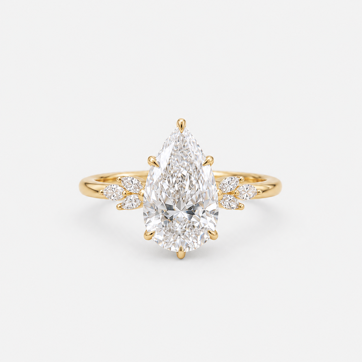 Pear Cut Diamond Engagement Ring with Floral Accent Diamonds in 14K Yellow Gold