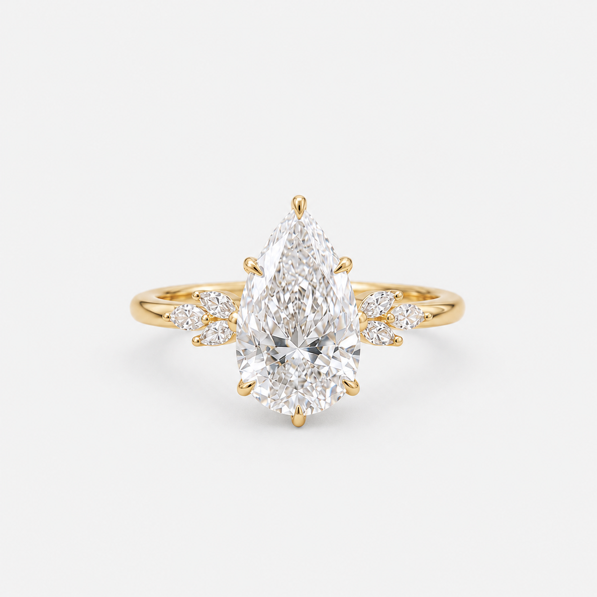 Pear Cut Diamond Engagement Ring with Floral Accent Diamonds in 14K Yellow Gold