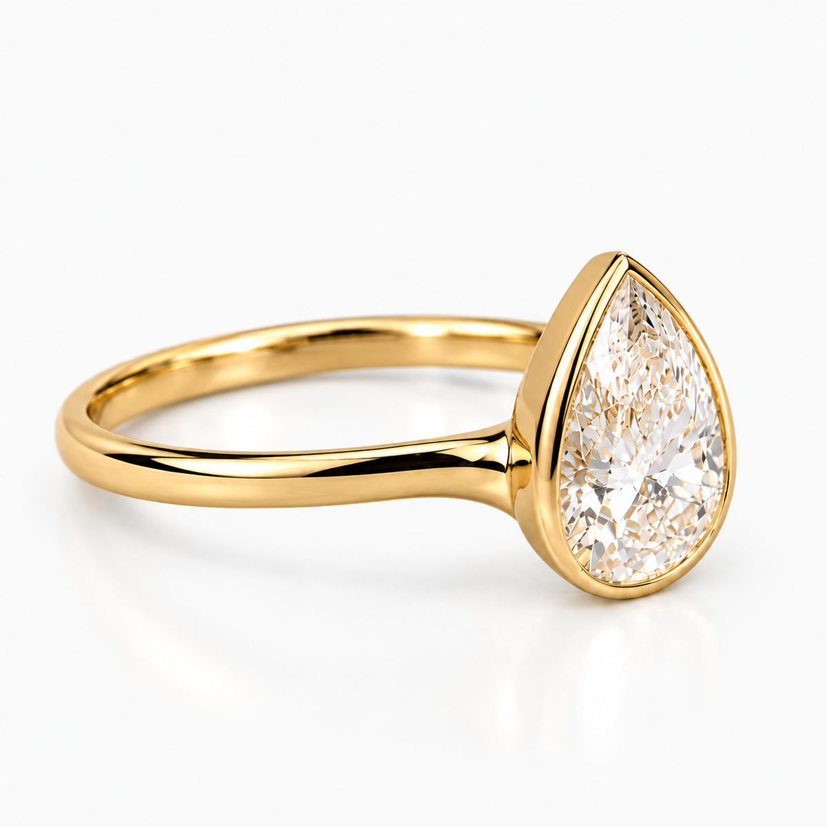 Pear Cut Lab Grown Diamond Bezel Set Engagement Ring in 14K Yellow Gold