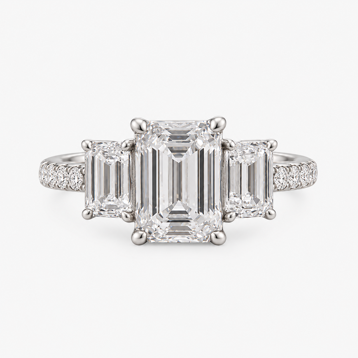 Lab Grown Diamond Emerald Cut Three-Stone Pavé Band Engagement Ring with Emerald Side Accents IGI Certified in 14K Yellow Gold
