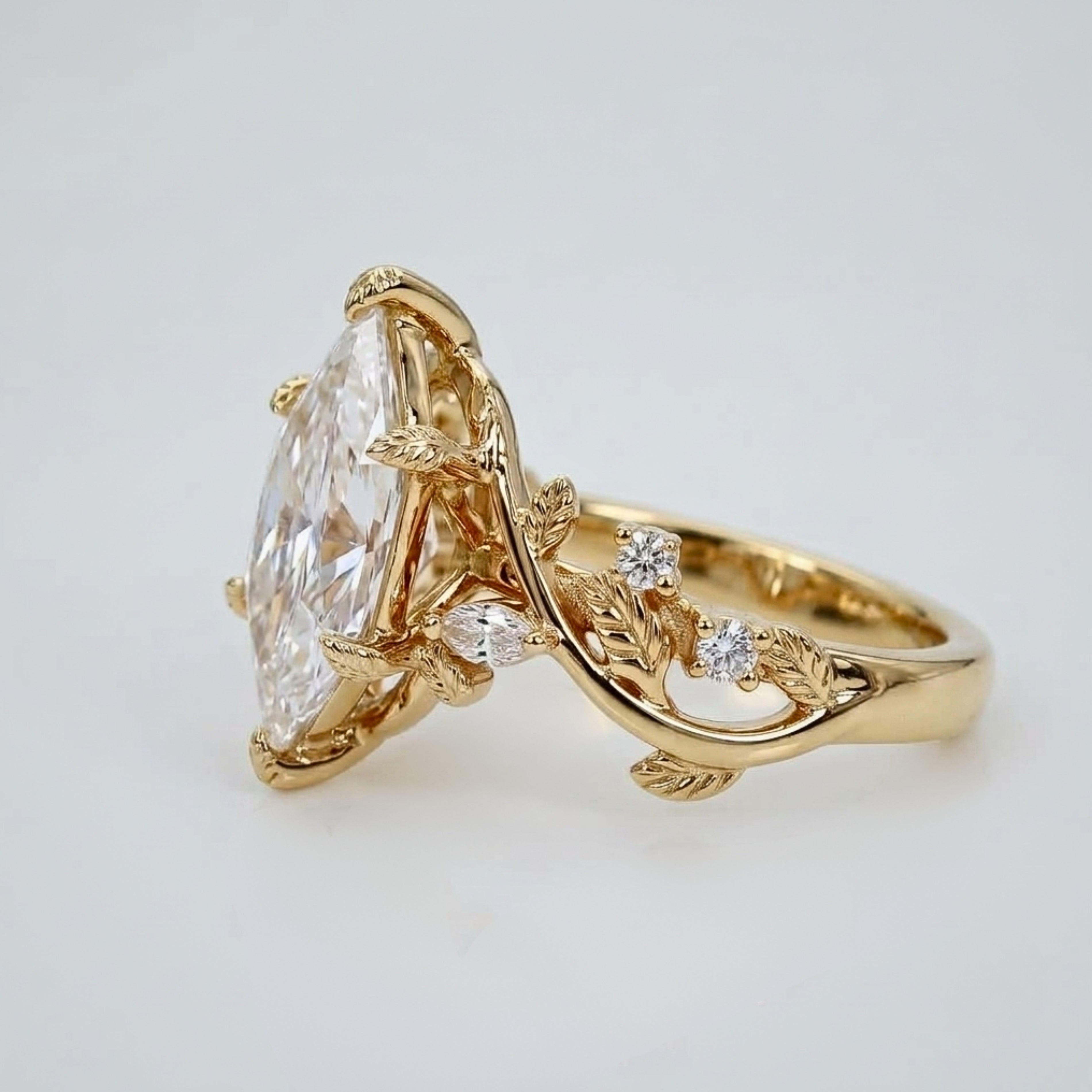 Lab Grown Diamond Dutch Marquise Cut with Marquise & Round Diamond Side Accents in Nature-Inspired Vine Band Engagement Ring IGI Certified in 14K Yellow Gold