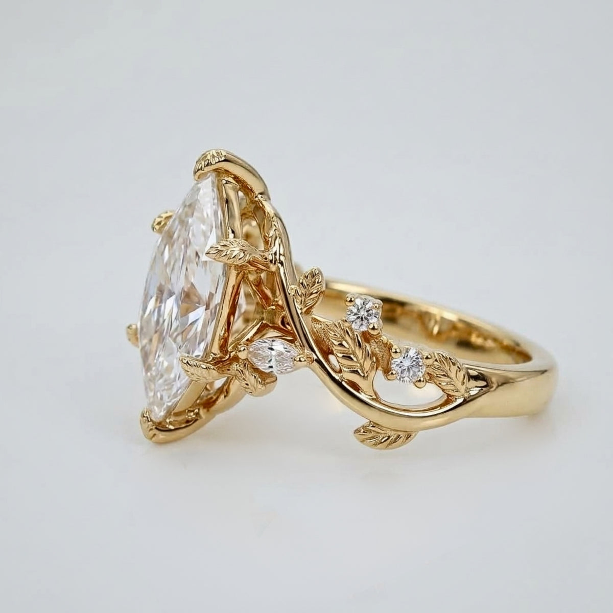 Lab Grown Diamond Dutch Marquise Cut with Marquise & Round Diamond Side Accents in Nature-Inspired Vine Band Engagement Ring IGI Certified in 14K Yellow Gold