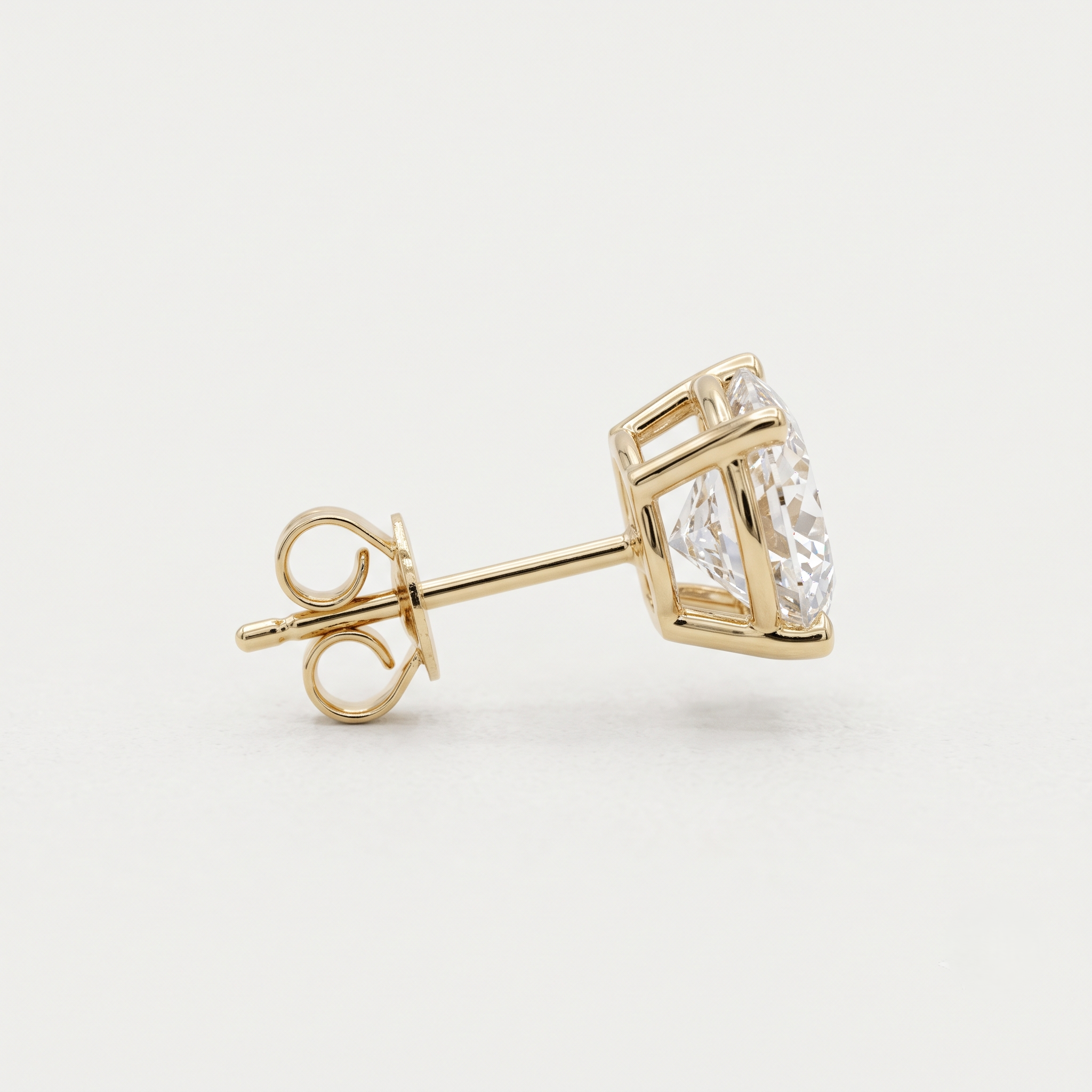 Lab Grown Oval Brilliant Cut Diamond Solitaire Stud Earring with Four-Prong Setting in 14K Yellow Gold