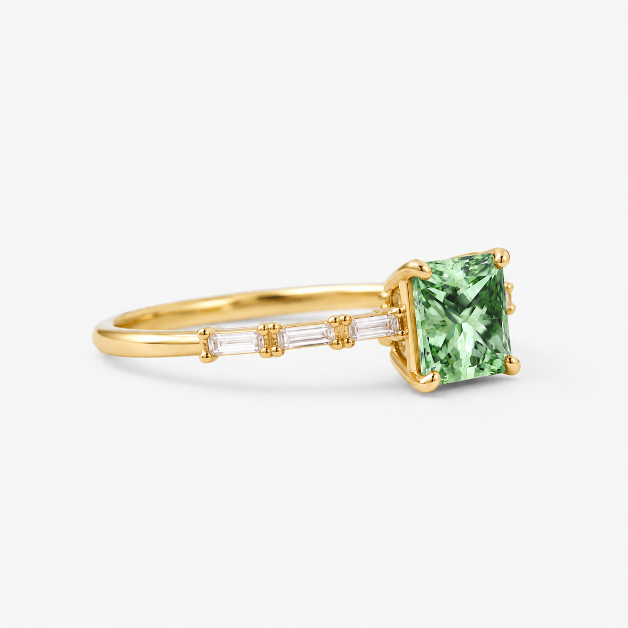 Lab Grown Green Princess Cut Three Stone Engagement Ring with Baguette Diamond Side Accents in 14K Yellow Gold