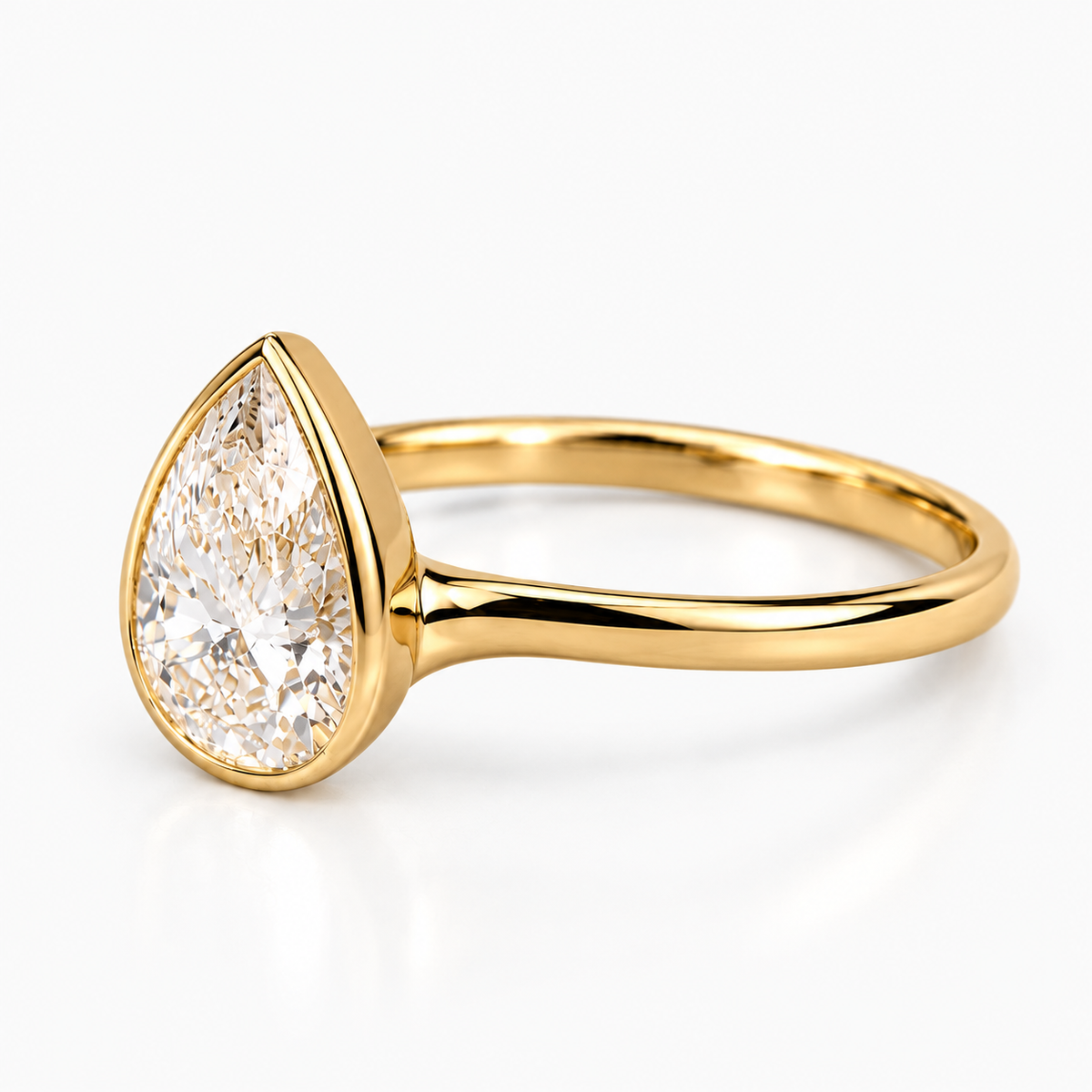 Pear Cut Lab Grown Diamond Bezel Set Engagement Ring in 14K Yellow Gold