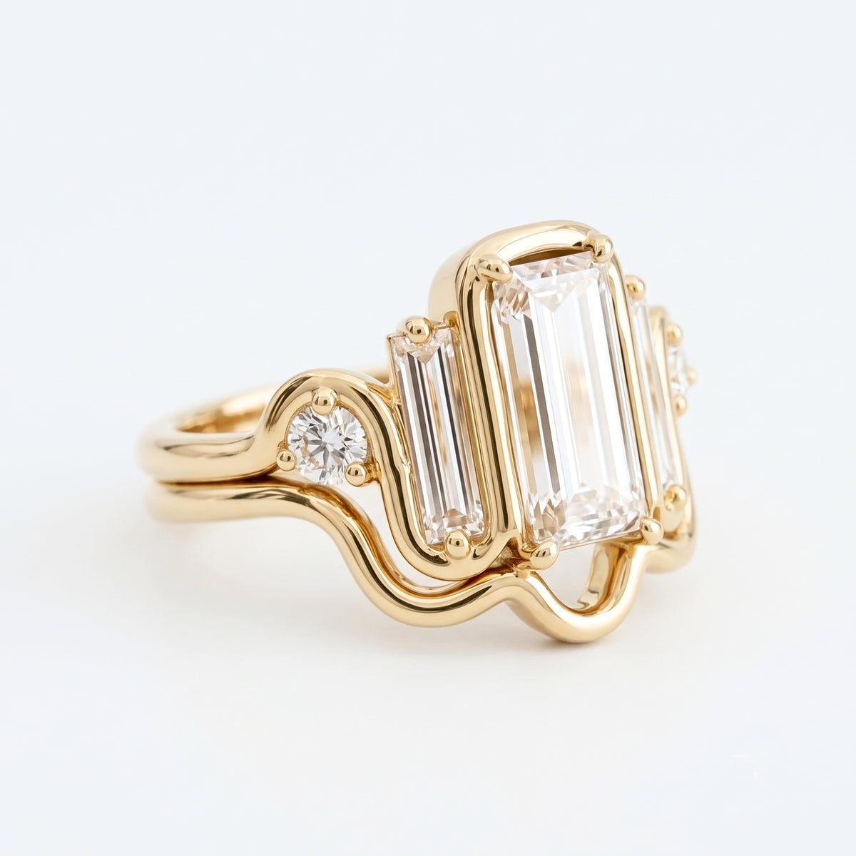 Lab Grown Diamond Elongated Emerald Cut Floating Bezel Curved Wave Nested Band Baguette Accent Engagement Ring IGI Certified in 14K Yellow Gold (Copy)
