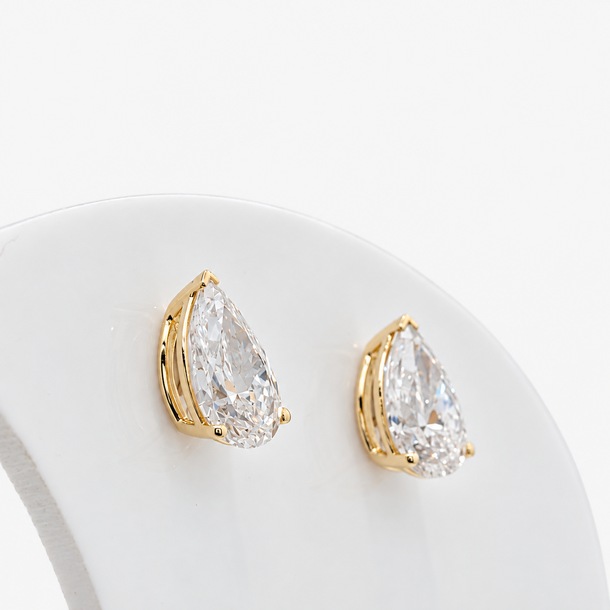 Lab Grown Diamond Pear Cut Three-Prong V-Cap Setting Stud Earrings IGI Certified in 14K Yellow Gold