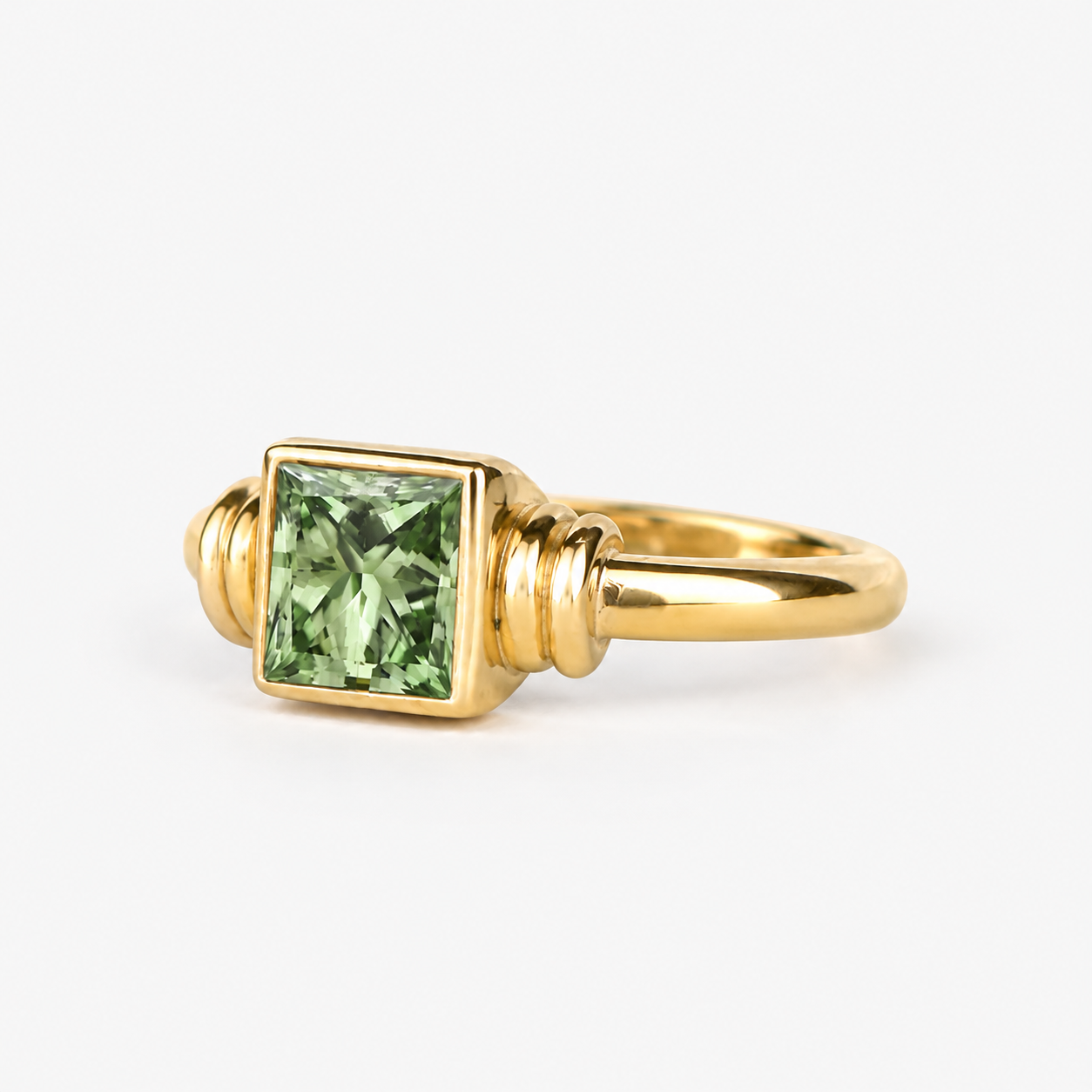 Lab Grown Green Princess Cut Bezel Set Engagement Ring with Sculptural Accent Band in 14K Yellow Gold