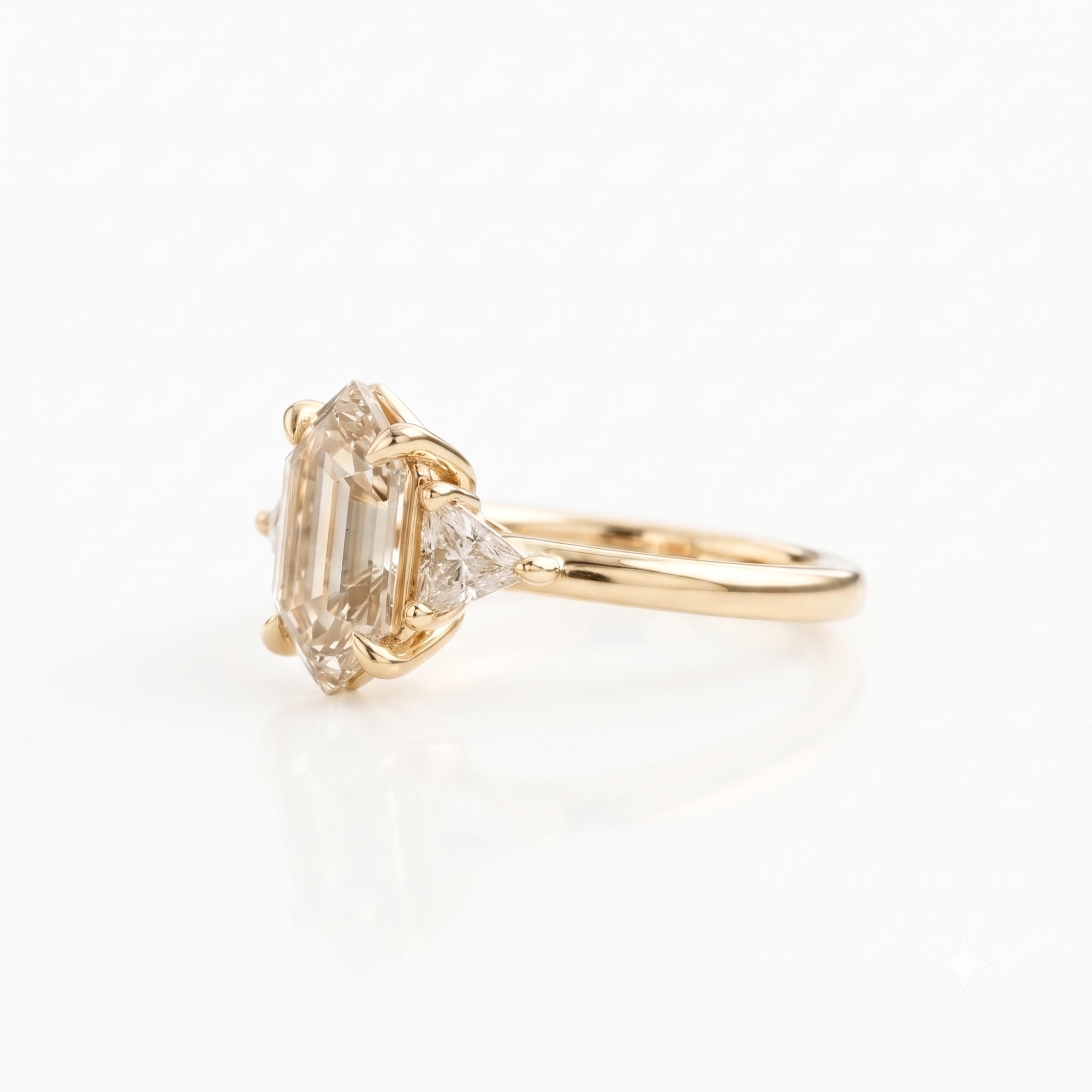 Lab Grown Diamond Elongated Hexagon Step Cut Classic Plain Solitaire Engagement Ring with Triangle Trillion Side Accents IGI Certified in 14K Yellow Gold