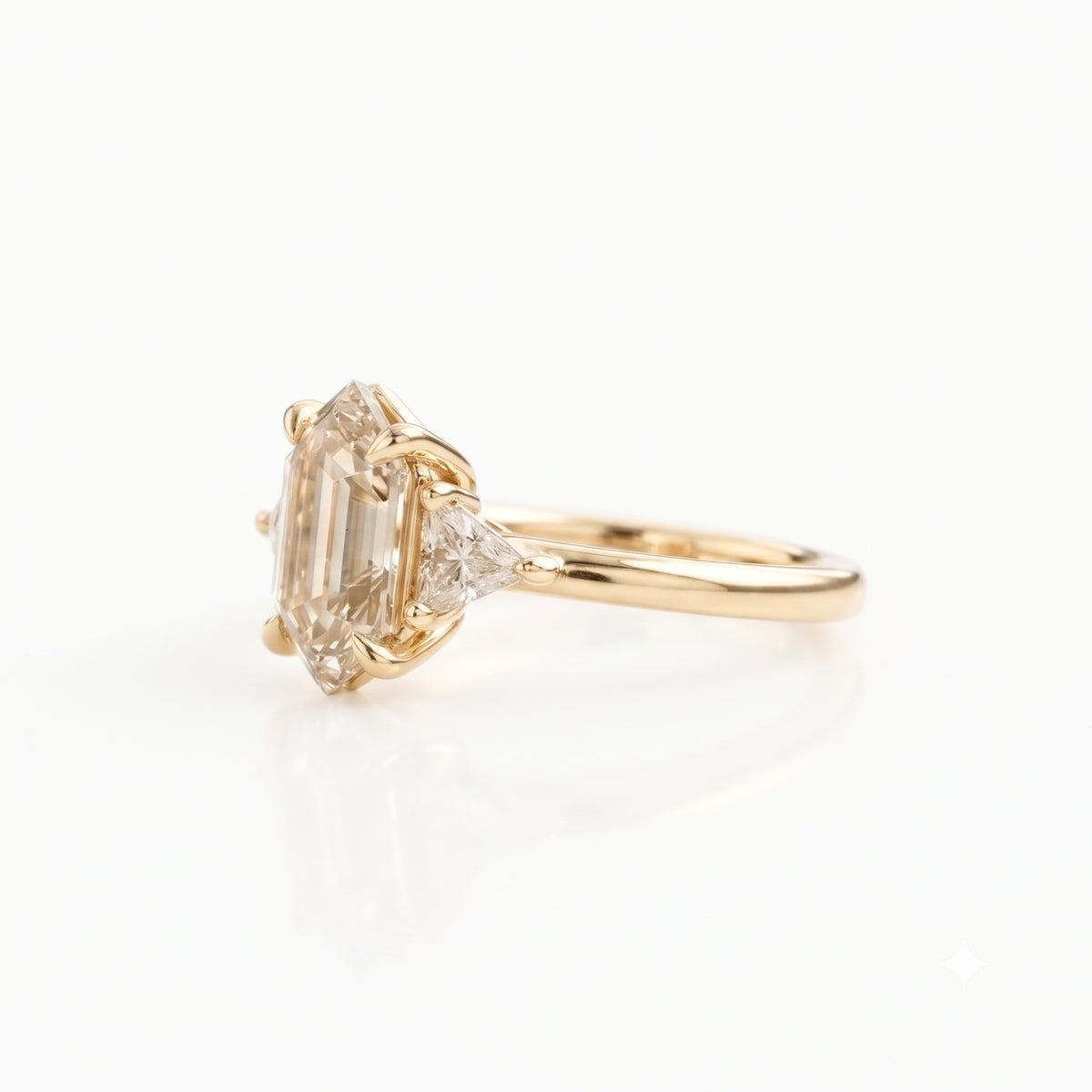 Lab Grown Diamond Elongated Hexagon Step Cut Classic Plain Solitaire Engagement Ring with Triangle Trillion Side Accents IGI Certified in 14K Yellow Gold
