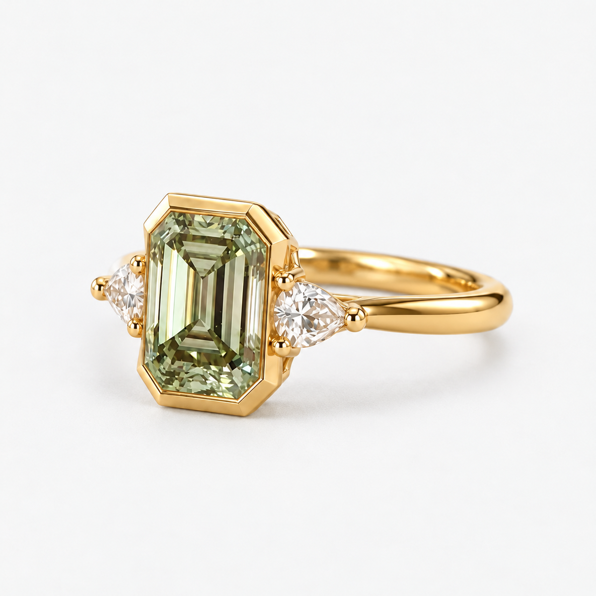 Lab Grown Green Emerald Cut Three Stone Engagement Ring with Pear Diamond Side Accents in 14K Yellow Gold