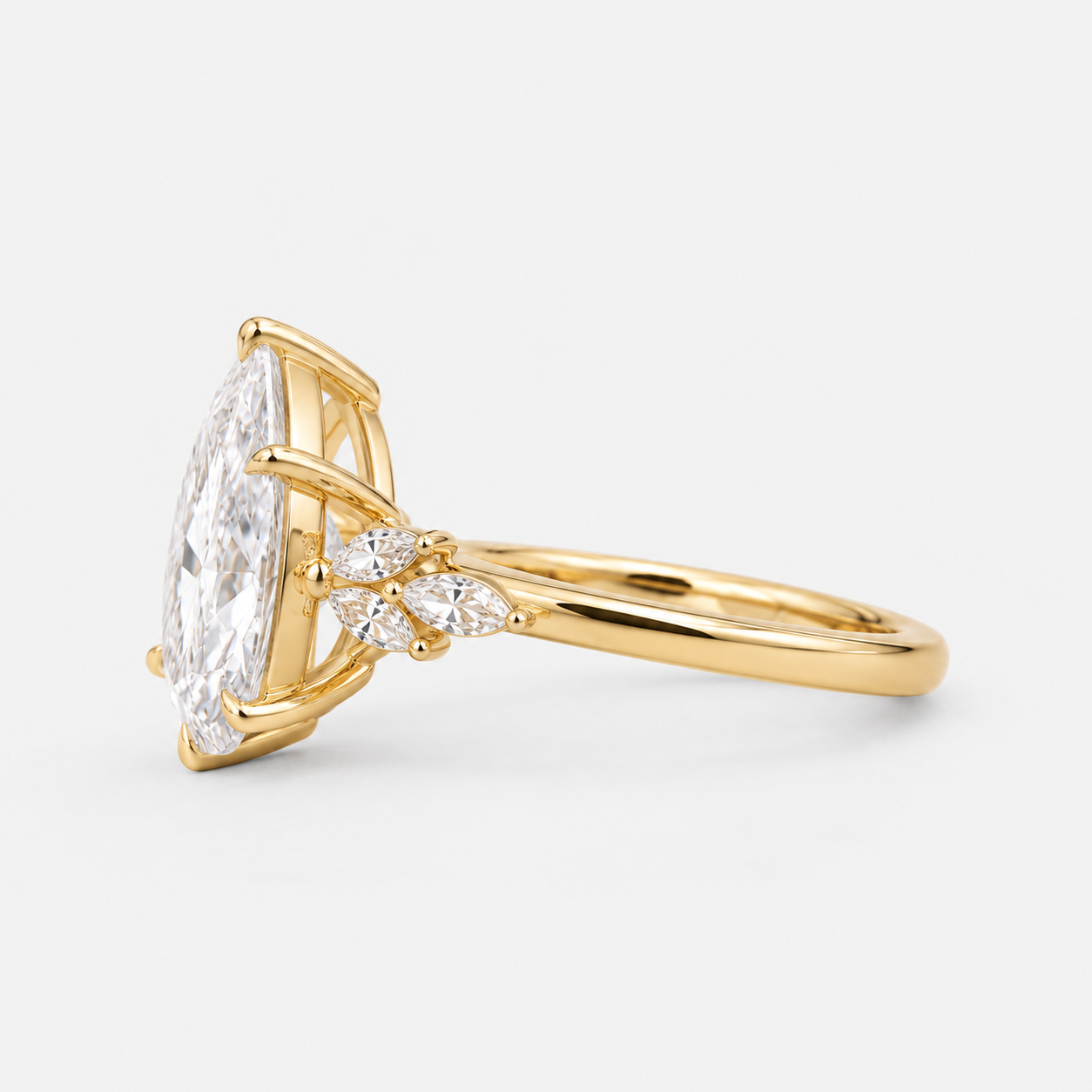 Pear Cut Diamond Engagement Ring with Floral Accent Diamonds in 14K Yellow Gold
