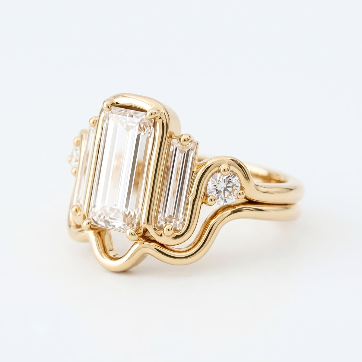 Lab Grown Diamond Elongated Emerald Cut Floating Bezel Curved Wave Nested Band Baguette Accent Engagement Ring IGI Certified in 14K Yellow Gold (Copy)