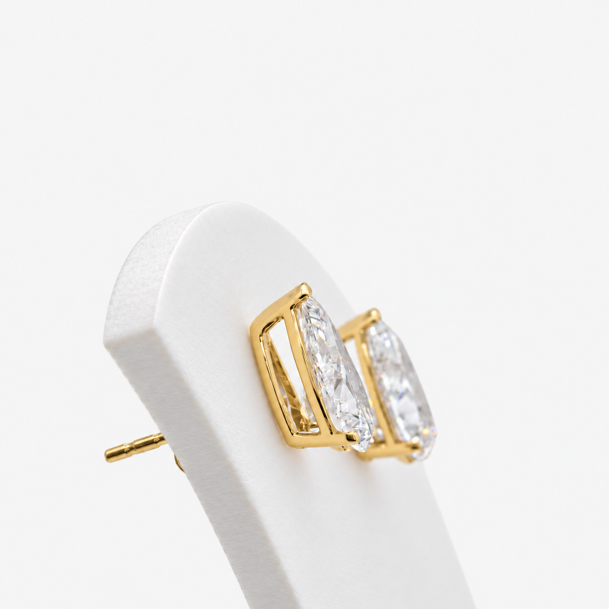 Lab Grown Diamond Pear Cut Three-Prong V-Cap Setting Stud Earrings IGI Certified in 14K Yellow Gold