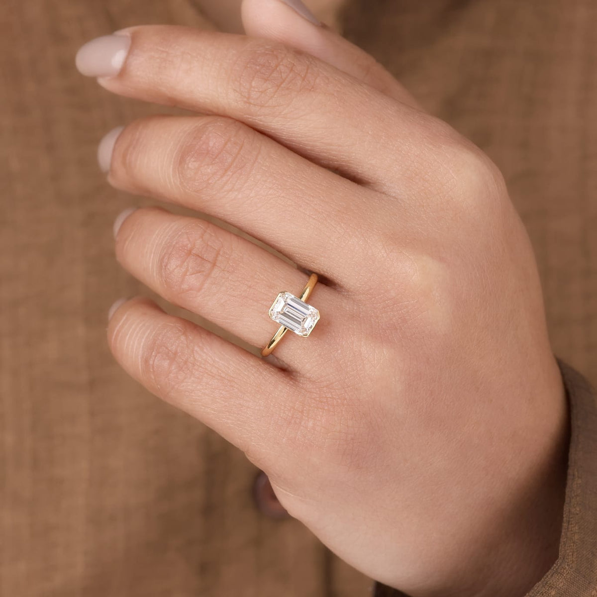Lab Grown Diamond Emerald Cut Full Bezel Solitaire Engagement Ring with Classic Plain Band IGI Certified in 14K Yellow Gold