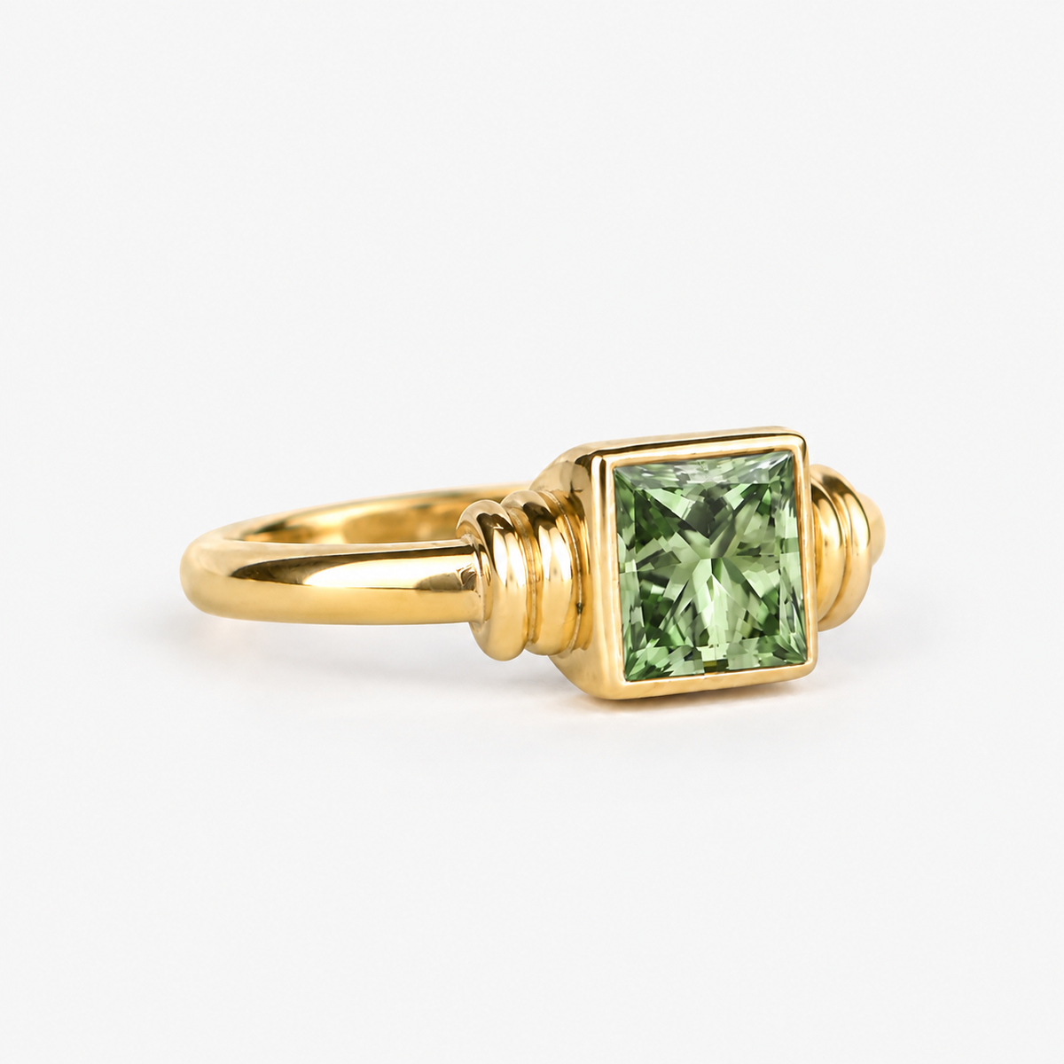 Lab Grown Green Princess Cut Bezel Set Engagement Ring with Sculptural Accent Band in 14K Yellow Gold