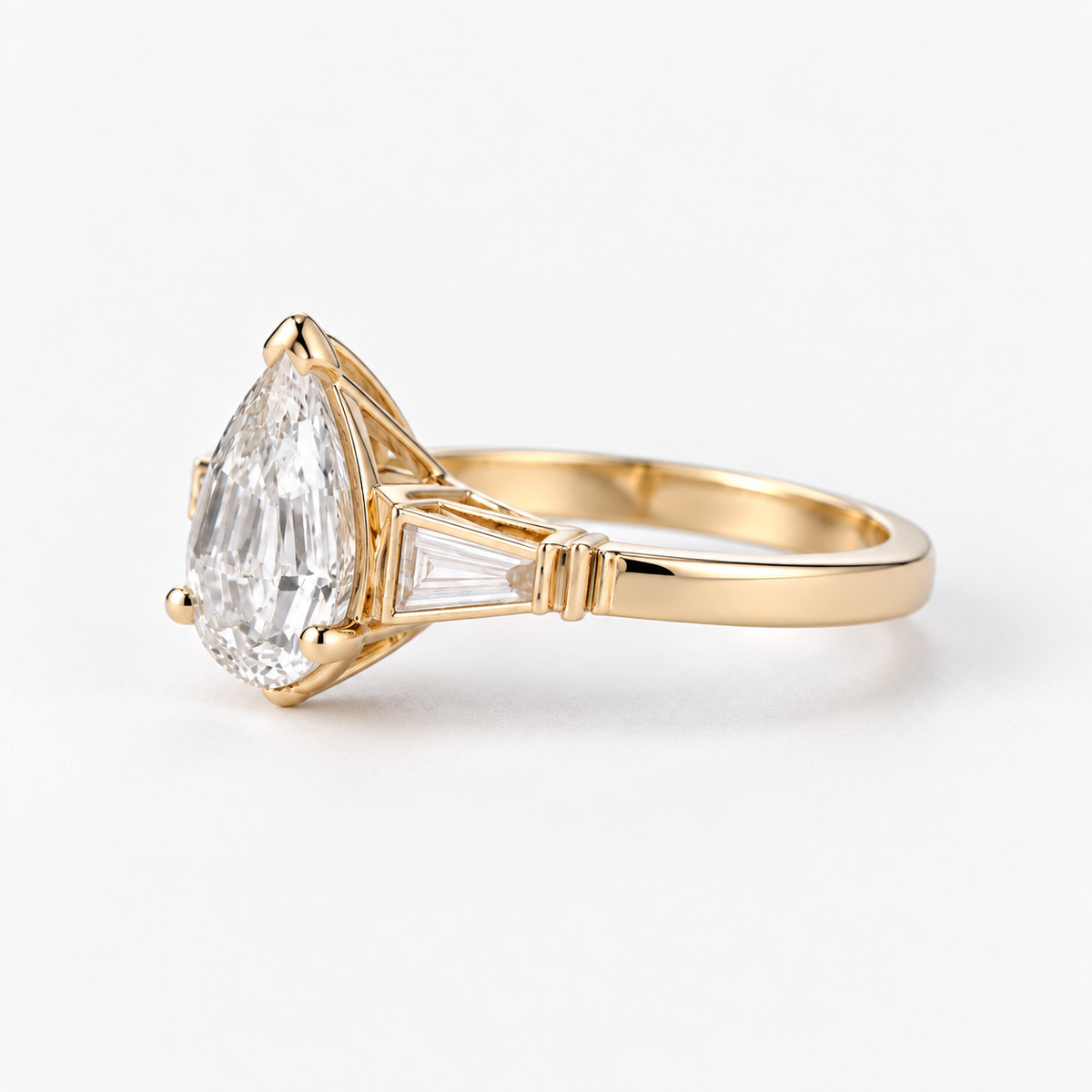 Lab Grown Diamond Pear Step Cut Three-Stone Tapered Baguette Side Accent Engagement Ring IGI Certified in 14K Yellow Gold