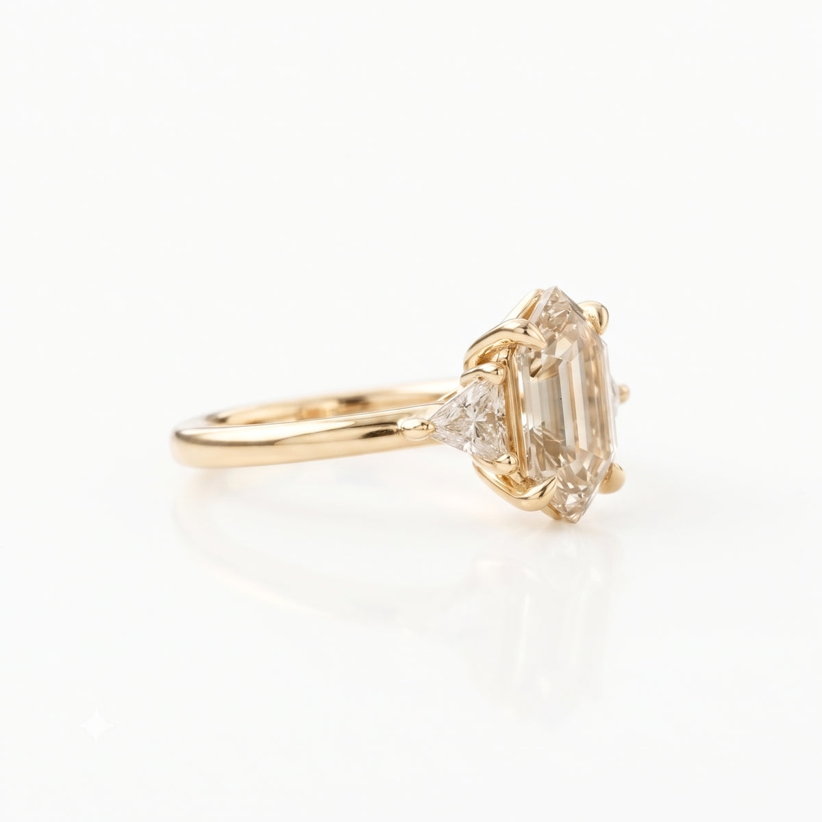 Lab Grown Diamond Elongated Hexagon Step Cut Classic Plain Solitaire Engagement Ring with Triangle Trillion Side Accents IGI Certified in 14K Yellow Gold