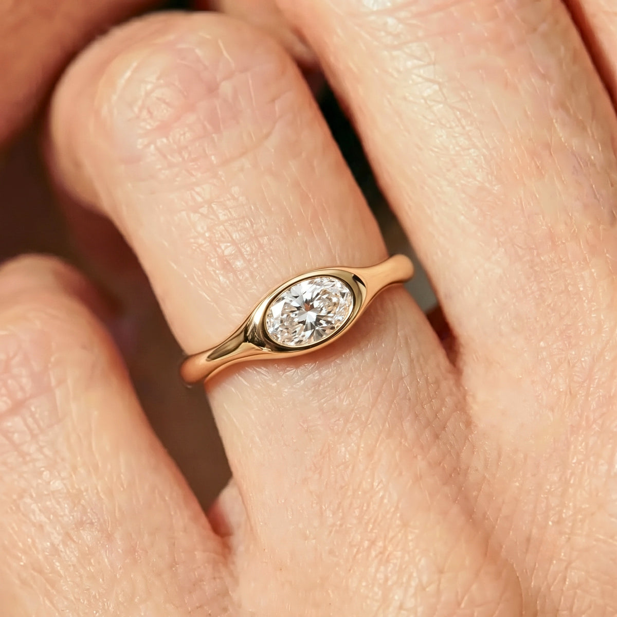 Lab Grown Diamond Oval Brilliant Cut East-West Organic Wavy Bezel Engagement Ring IGI Certified in 14K Yellow Gold
