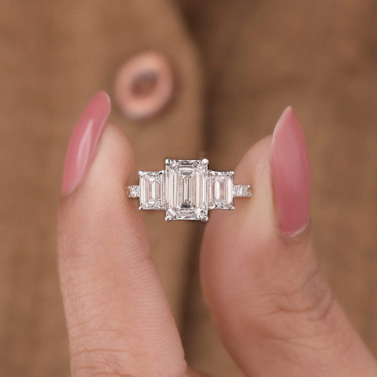 Lab Grown Diamond Emerald Cut Three-Stone Pavé Band Engagement Ring with Emerald Side Accents IGI Certified in 14K Yellow Gold
