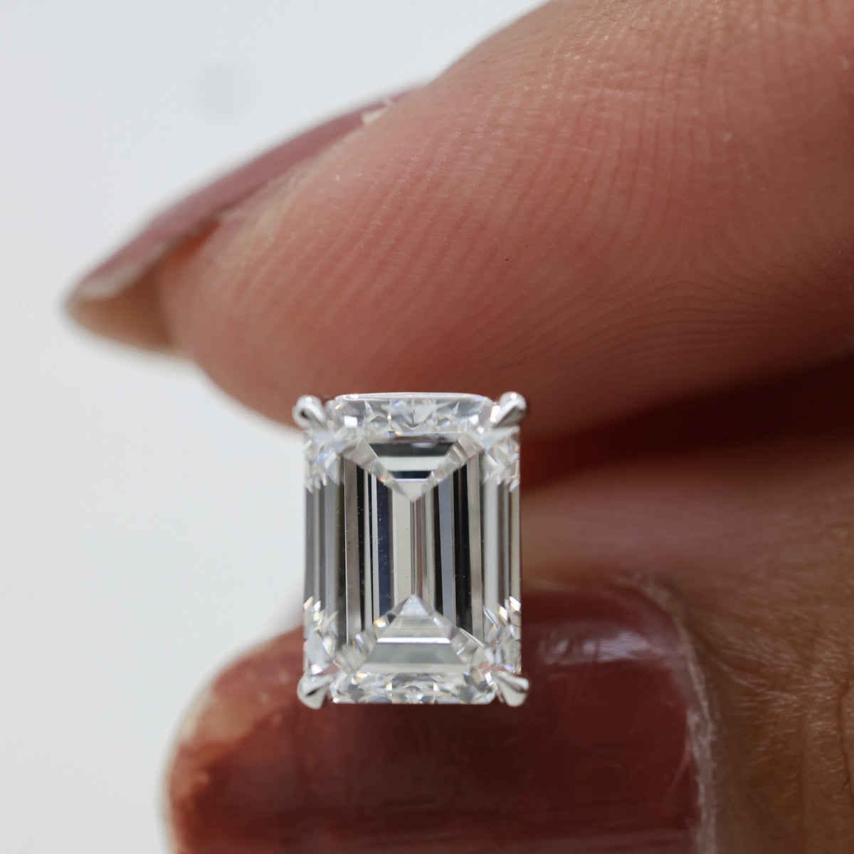 Lab Grown Diamond Emerald Cut Solitaire Stud Earrings in Four Prong Setting