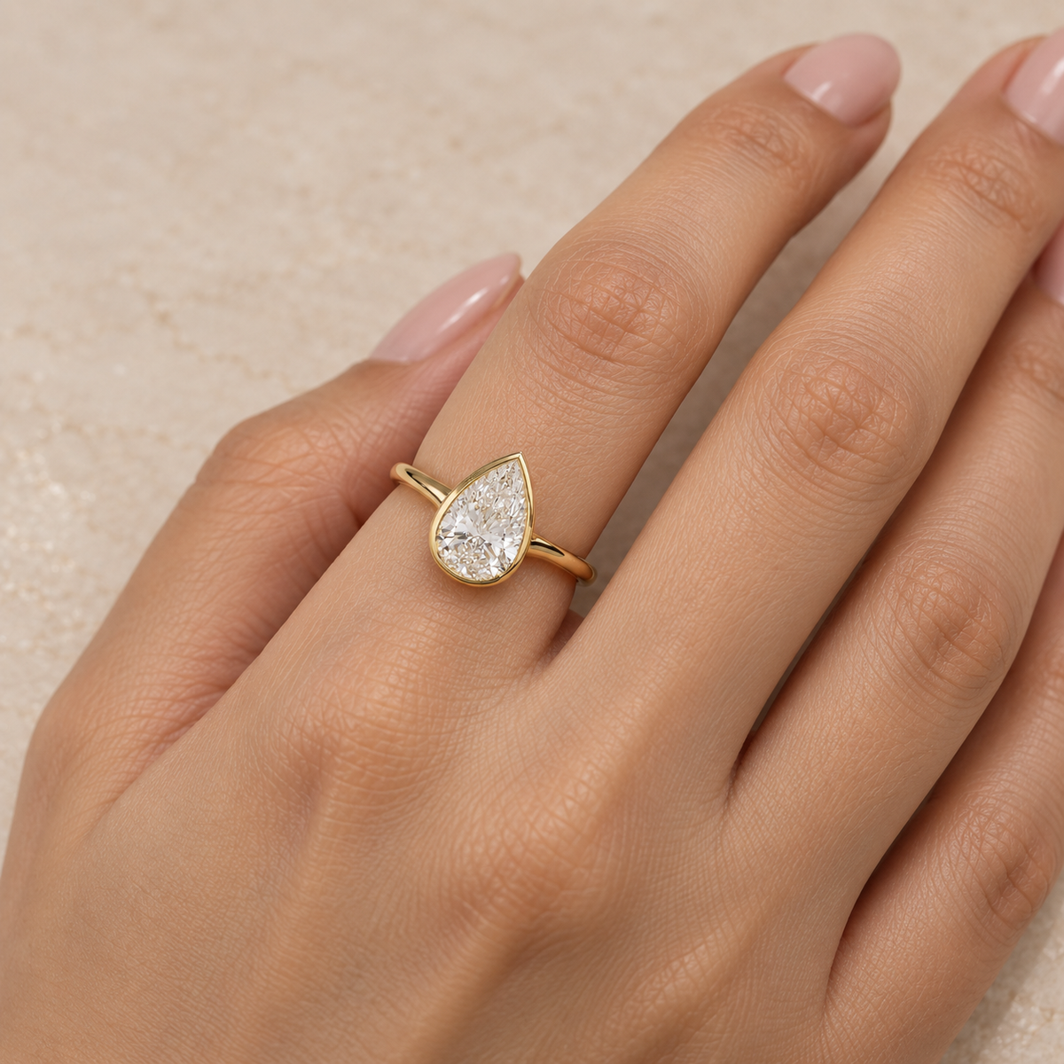 Pear Cut Lab Grown Diamond Bezel Set Engagement Ring in 14K Yellow Gold