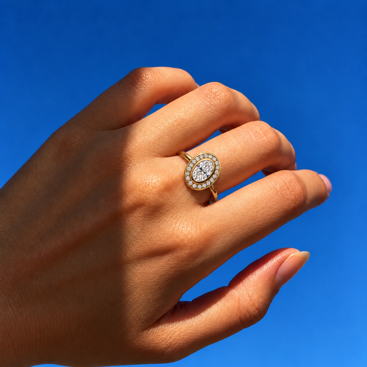 Oval Cut Bezel Halo Lab Grown Diamond Engagement Ring in 14K Yellow Gold