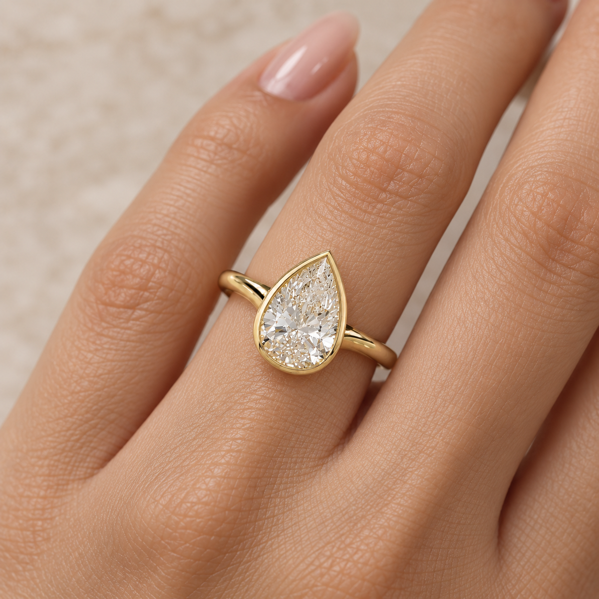 Pear Cut Lab Grown Diamond Bezel Set Engagement Ring in 14K Yellow Gold