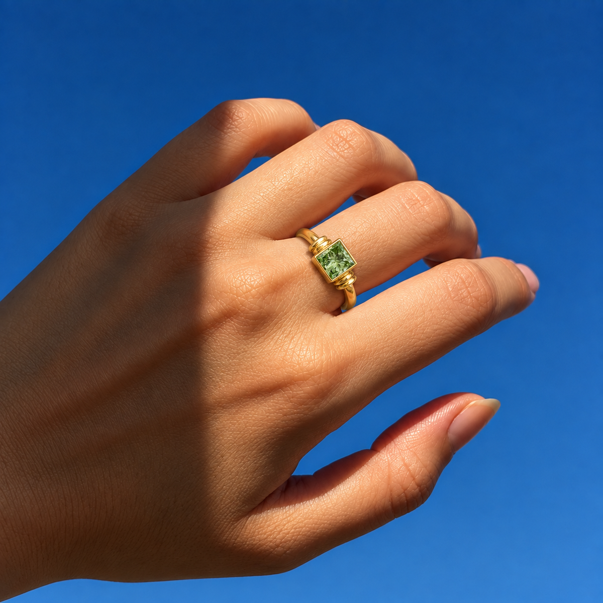 Lab Grown Green Princess Cut Bezel Set Engagement Ring with Sculptural Accent Band in 14K Yellow Gold