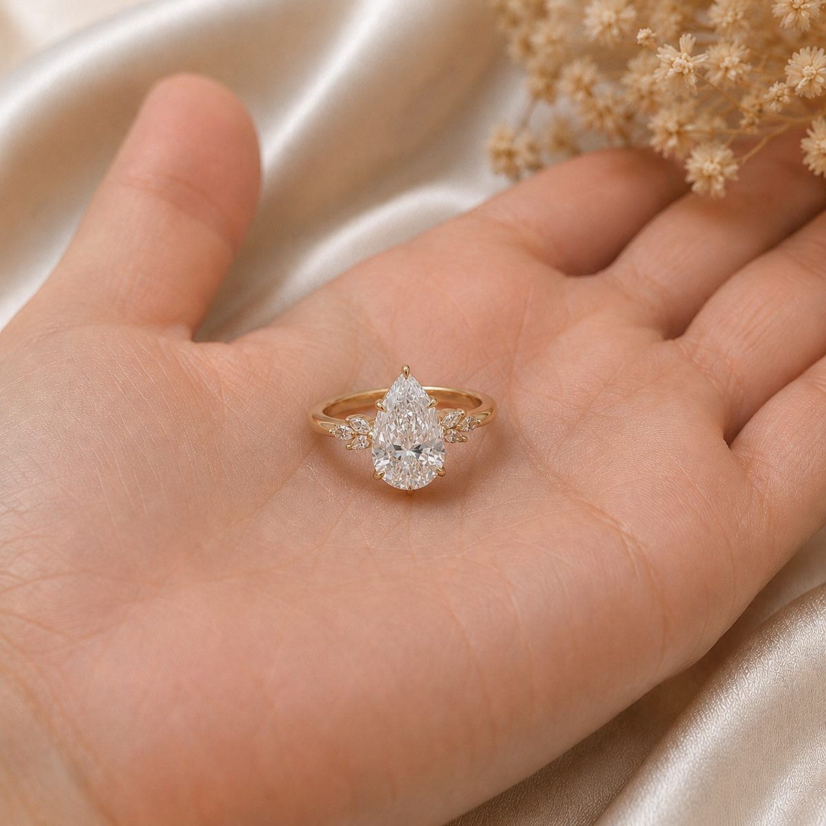 Pear Cut Diamond Engagement Ring with Floral Accent Diamonds in 14K Yellow Gold
