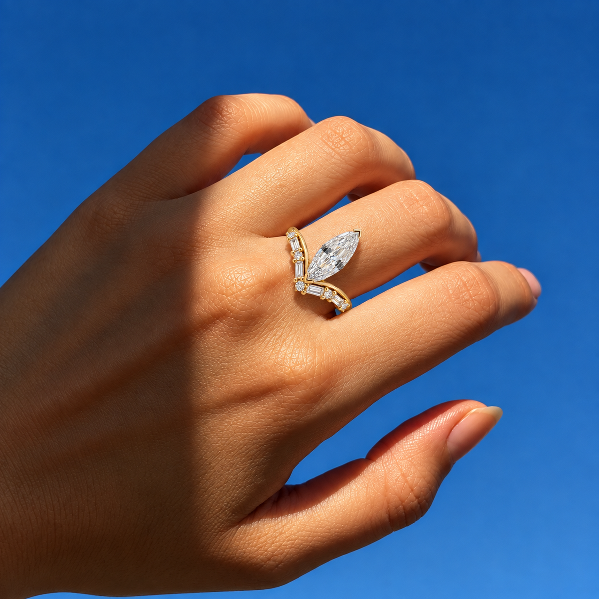 Lab Grown Diamond Marquise Step Cut Curved Chevron V-Band Baguette and Round Accent Engagement Ring IGI Certified in 14K Yellow Gold