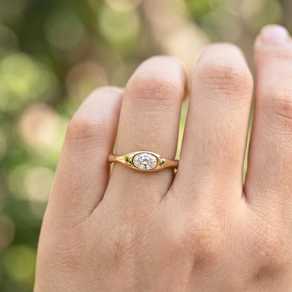 Lab Grown Diamond Oval Brilliant Cut East-West Organic Wavy Bezel Engagement Ring IGI Certified in 14K Yellow Gold