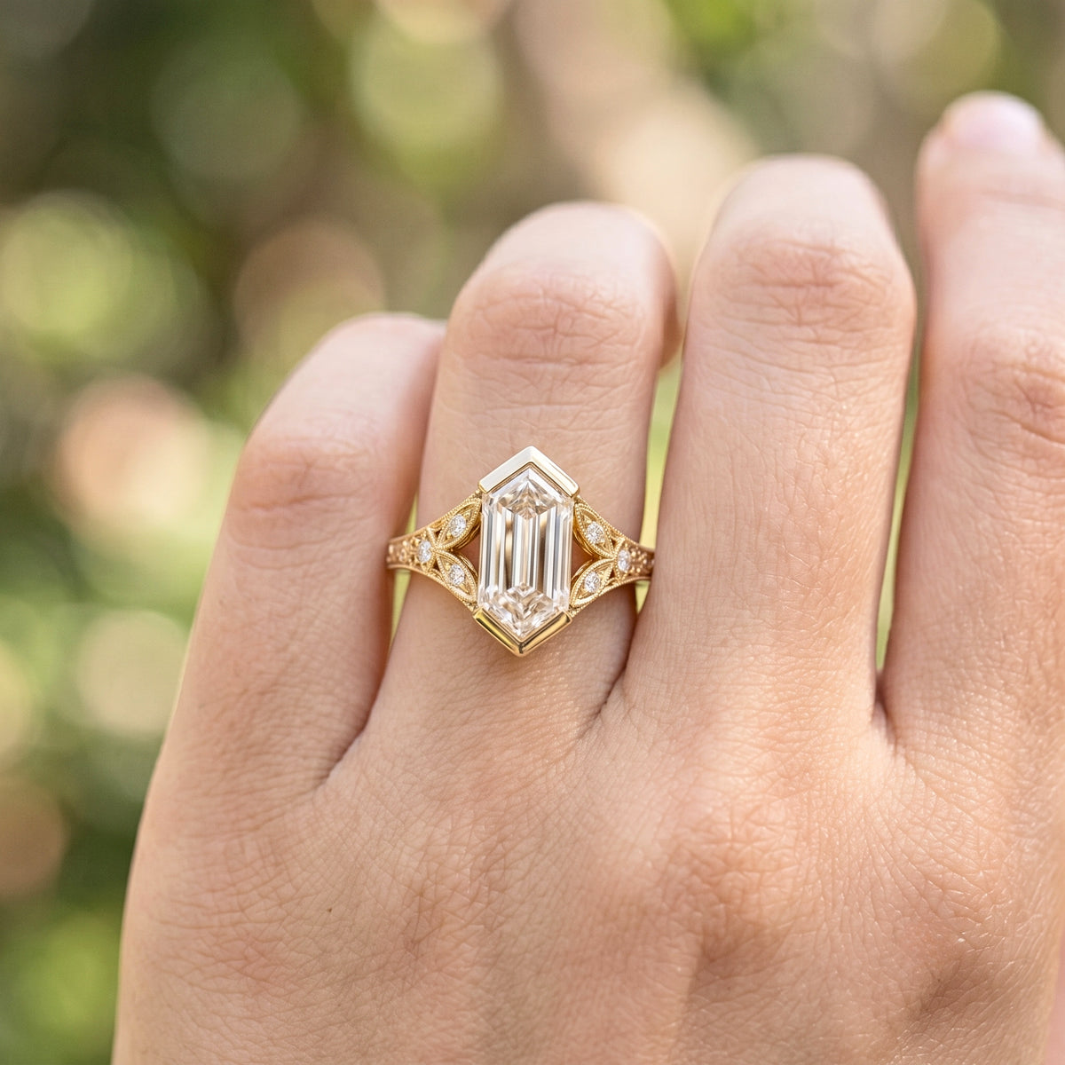 Lab Grown Diamond Elongated Hexagon Step Cut Vintage Filigree Engraved Bezel Engagement Ring with Round Side Accents IGI Certified in 14K Yellow Gold