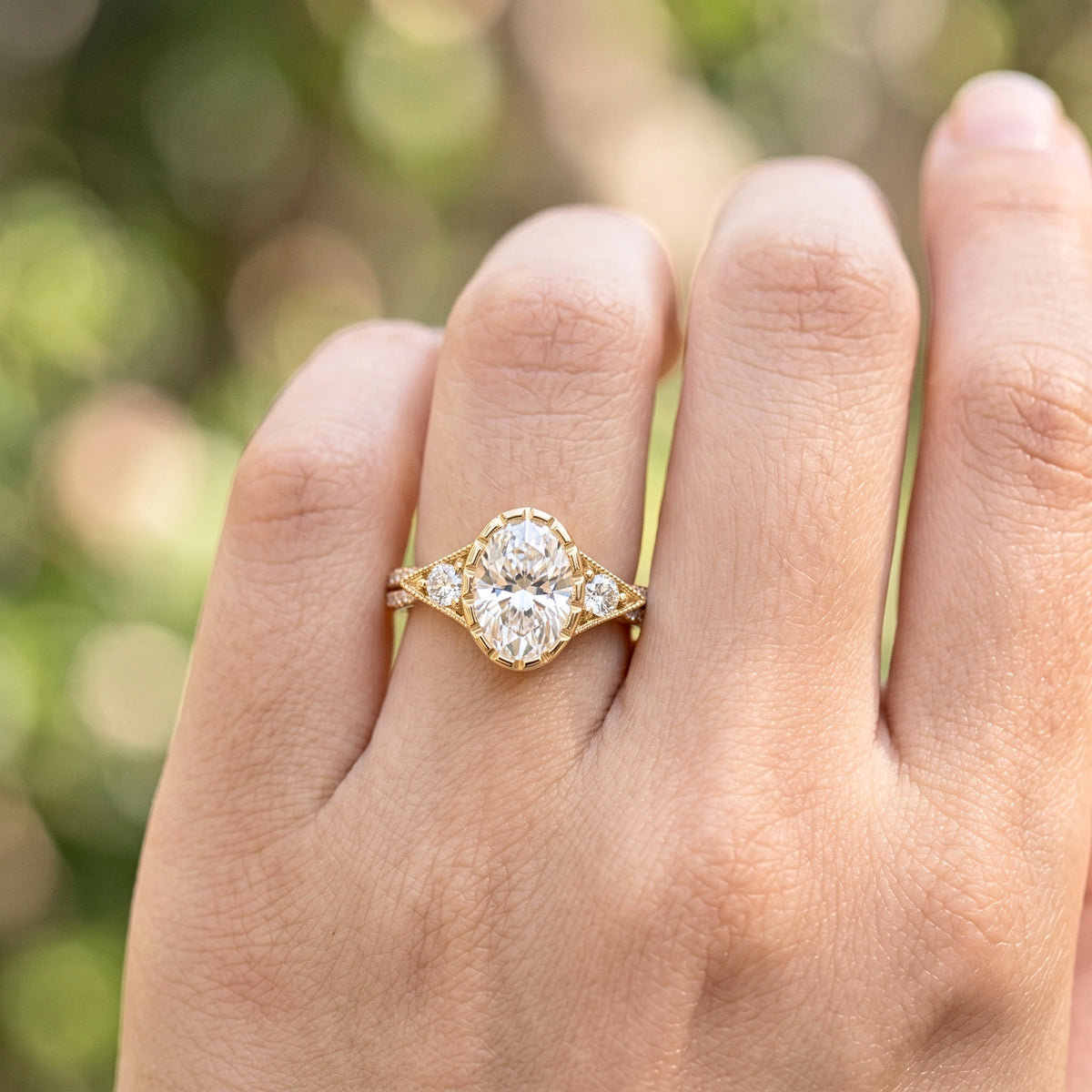 Lab Grown Diamond Oval Cut Vintage Milgrain Bezel Three-Stone Engagement Ring with Round Side Accents IGI Certified in 14K Yellow Gold