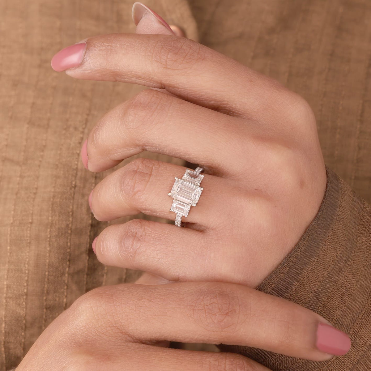 Lab Grown Diamond Emerald Cut Three-Stone Pavé Band Engagement Ring with Emerald Side Accents IGI Certified in 14K Yellow Gold