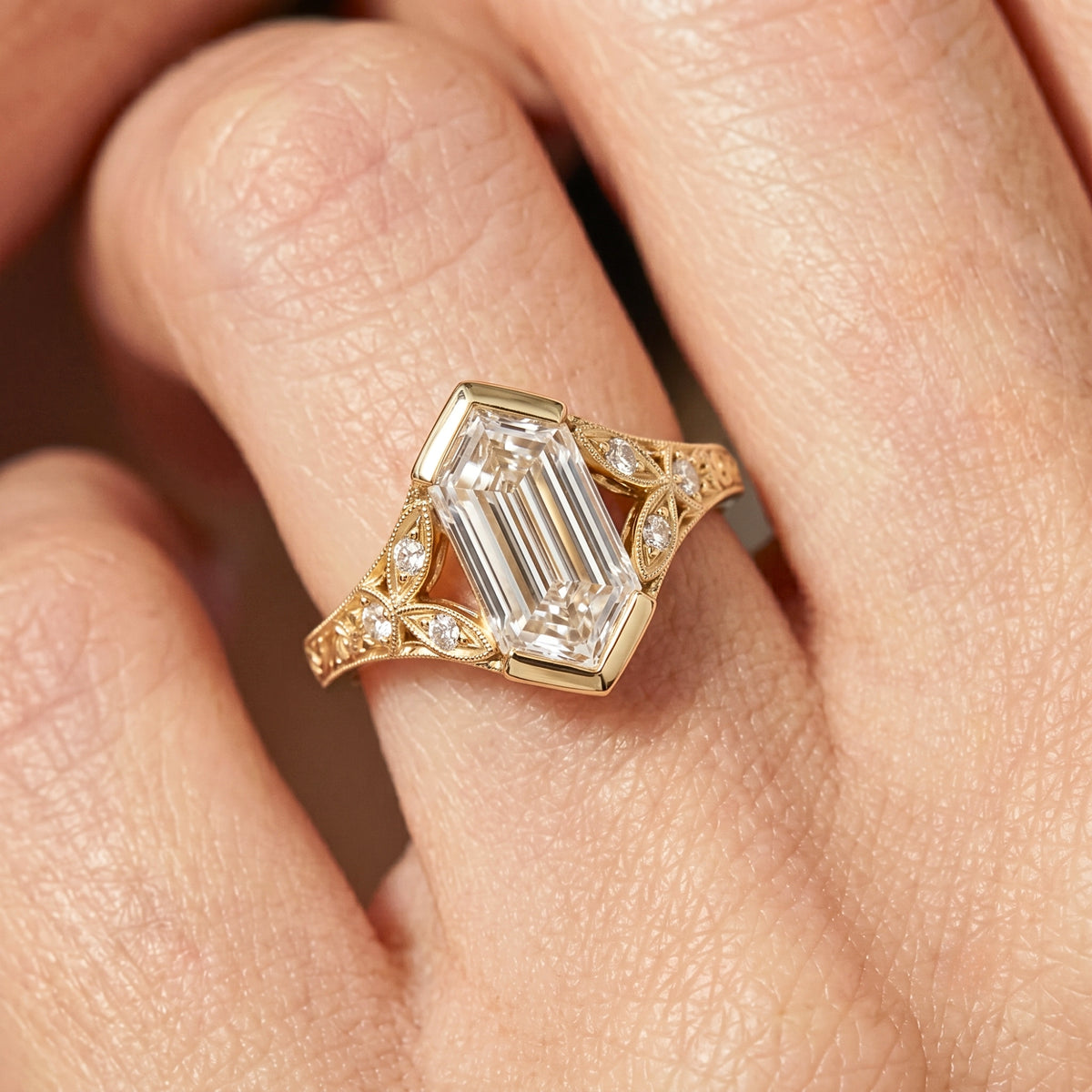 Lab Grown Diamond Elongated Hexagon Step Cut Vintage Filigree Engraved Bezel Engagement Ring with Round Side Accents IGI Certified in 14K Yellow Gold