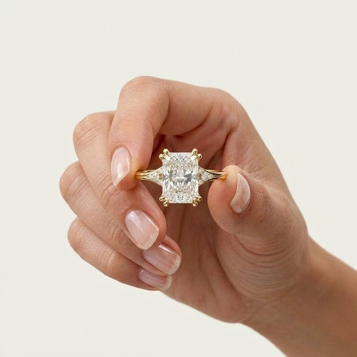 Lab Grown Diamond Radiant Cut Engagement Ring with Round Diamond Side Accents IGI Certified in 14K Yellow Gold