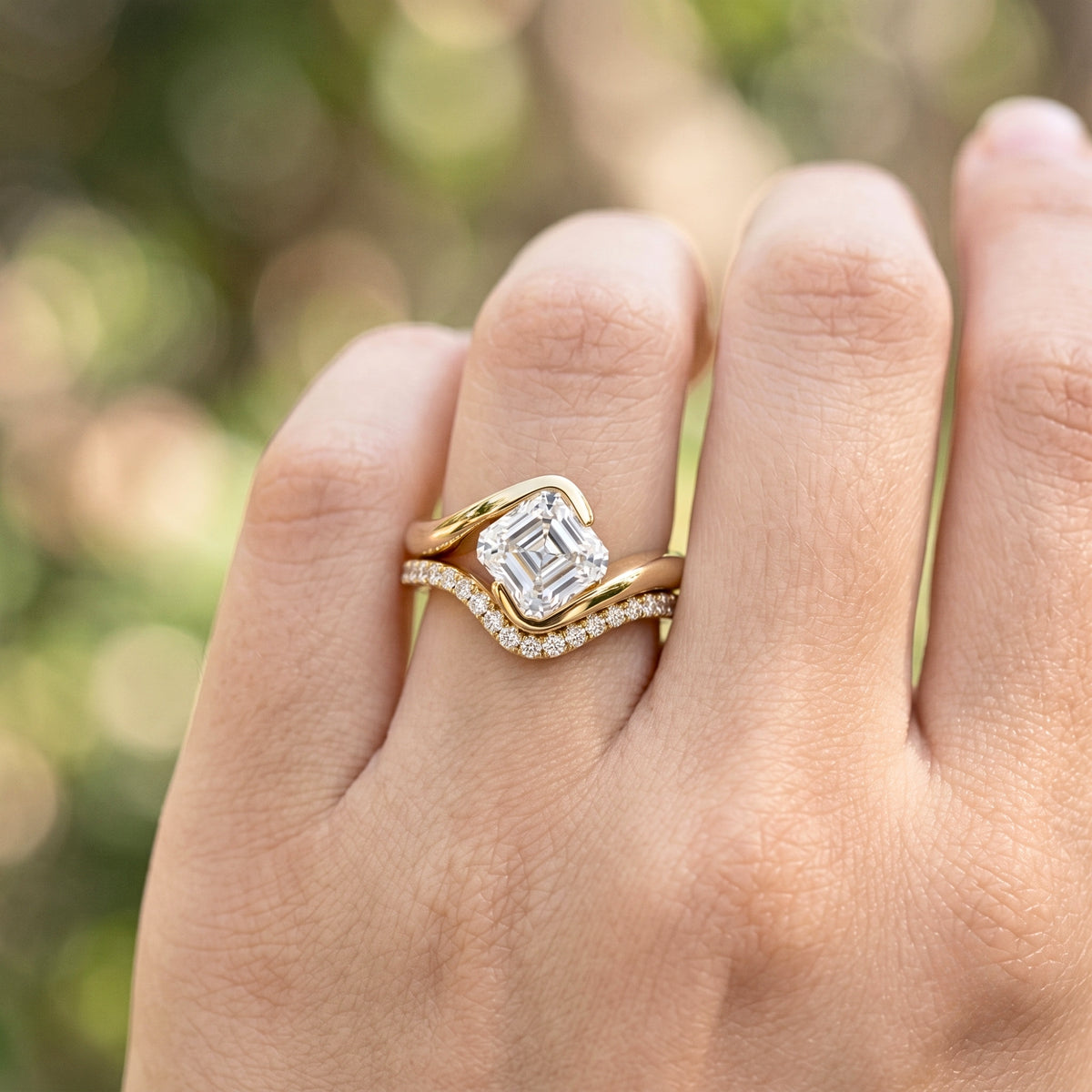 Lab Grown Diamond Asscher Square Step Cut Curved Bypass Bezel Engagement Ring with Curved Pavé Band Set IGI Certified in 14K Yellow Gold
