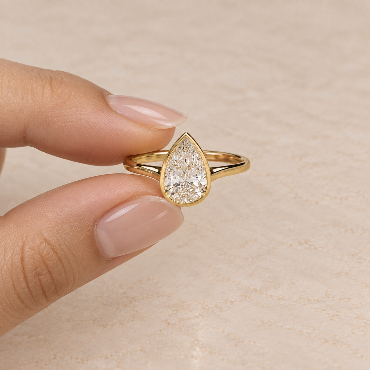 Pear Cut Lab Grown Diamond Bezel Set Engagement Ring in 14K Yellow Gold