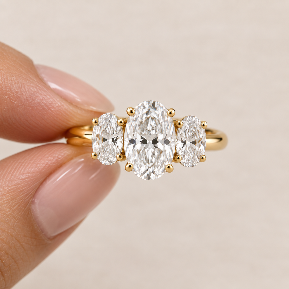 Lab Grown Diamond Oval Cut Three Stone Engagement Ring with Oval Side Stones in 14K Yellow Gold