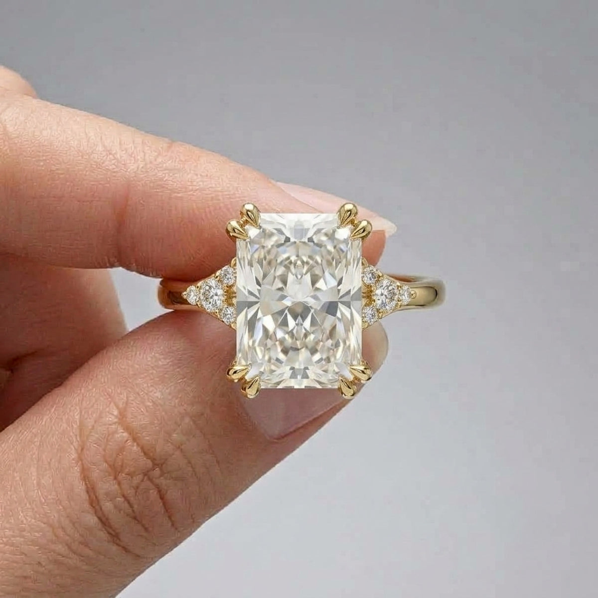 Lab Grown Diamond Radiant Cut Engagement Ring with Round Diamond Side Accents IGI Certified in 14K Yellow Gold