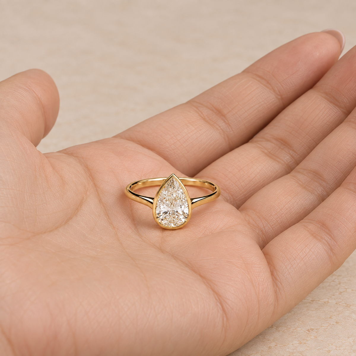 Pear Cut Lab Grown Diamond Bezel Set Engagement Ring in 14K Yellow Gold