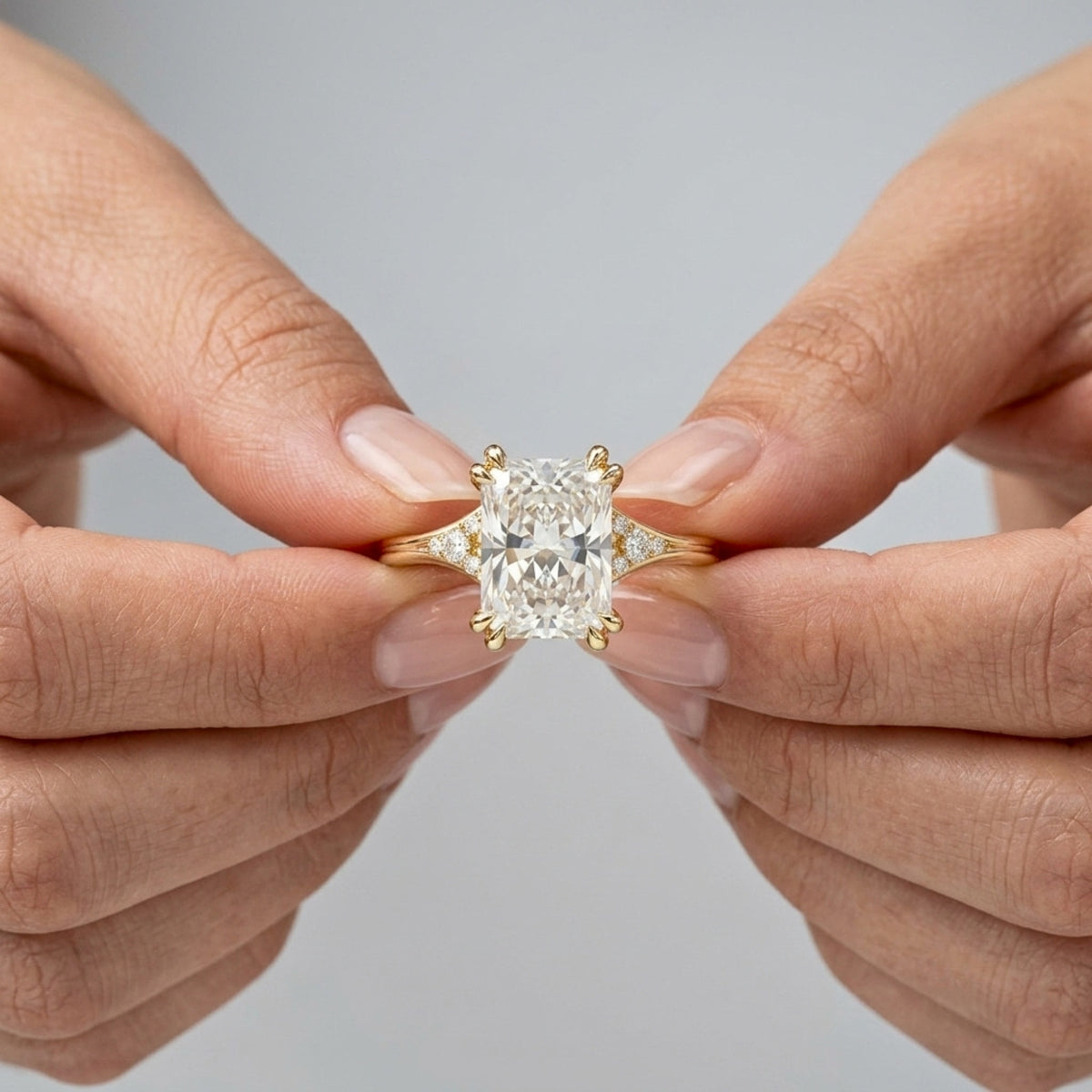 Lab Grown Diamond Radiant Cut Engagement Ring with Round Diamond Side Accents IGI Certified in 14K Yellow Gold