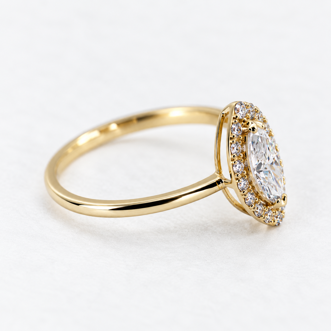 Lab Grown DiamondMarquise Cut Diamond Halo Engagement Ring in 14K Yellow Gold